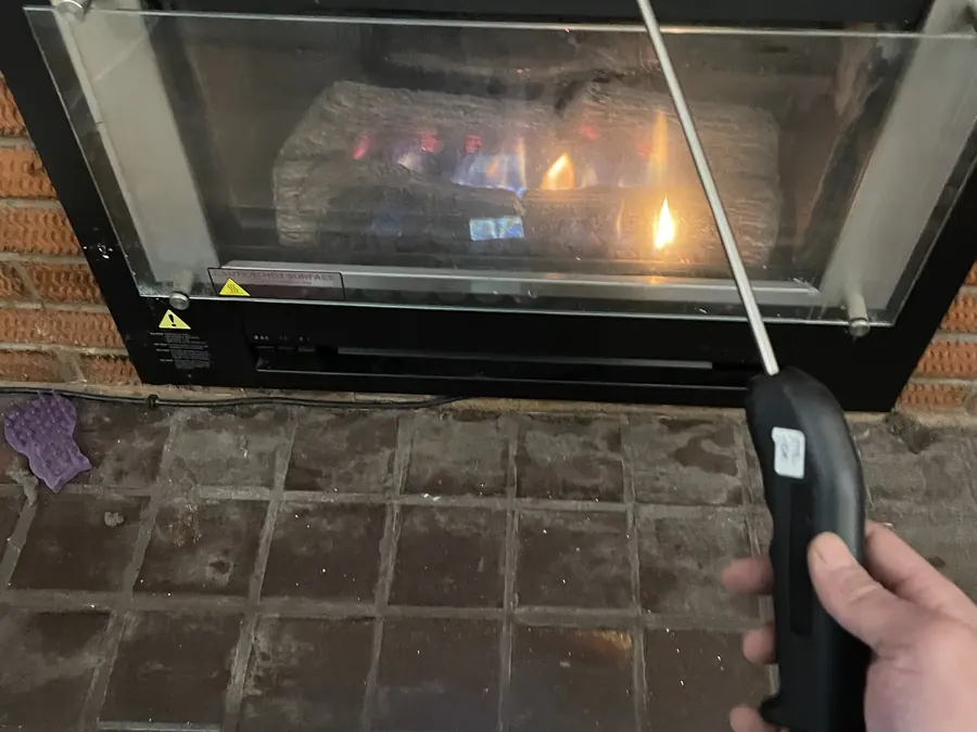 Carbon monoxide testing on a gas log fire using a flue gas analyser